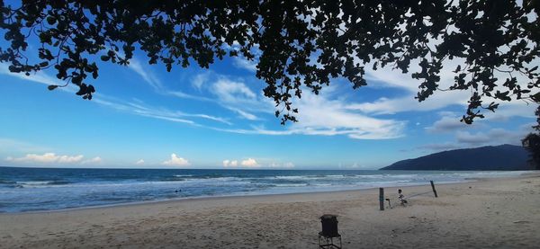 Scenic view of beach against sky