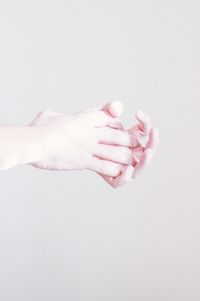 Close-up of human hand against blurred background