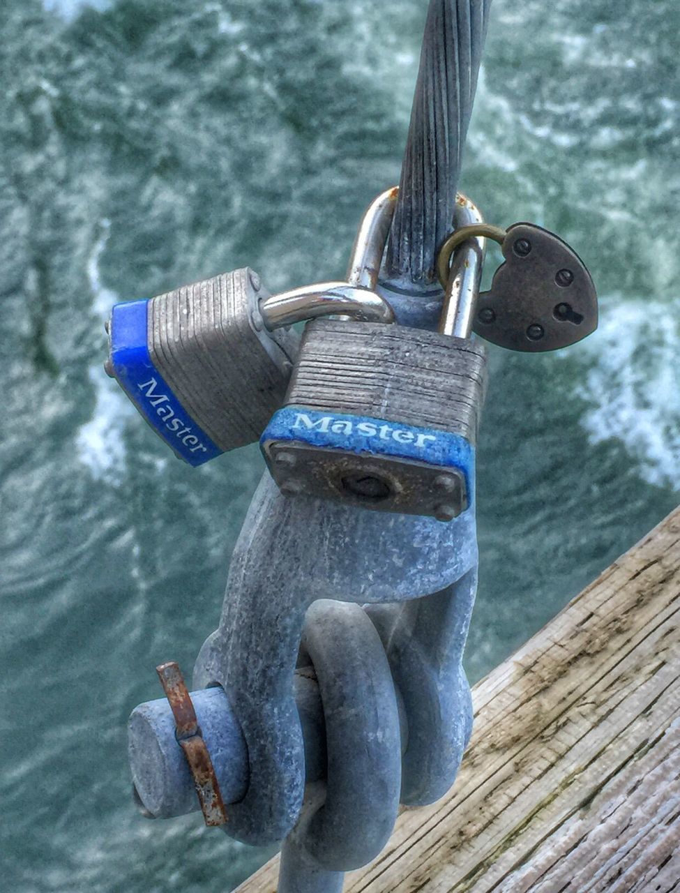 metal, wood - material, focus on foreground, close-up, rope, water, rusty, wooden, metallic, protection, day, outdoors, chain, safety, tied up, no people, wood, attached, padlock, hanging