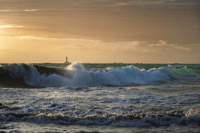 Scenic view of sea against sky during sunset