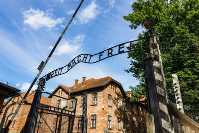 Main gates to auschwitz-birkenau concentration camp. auschwitz, poland, 17 july 2022