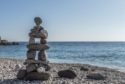 Stones balanced on the beach