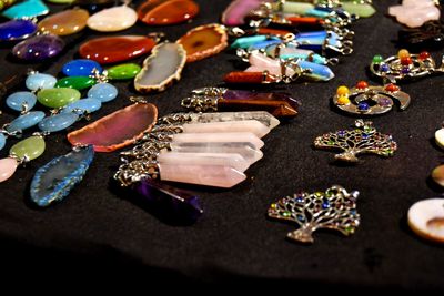 Close-up of colorful jewelries on table