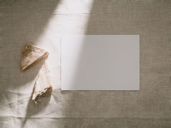 Invitation card mockup, blank greeting card template. flat lay, minimalist style