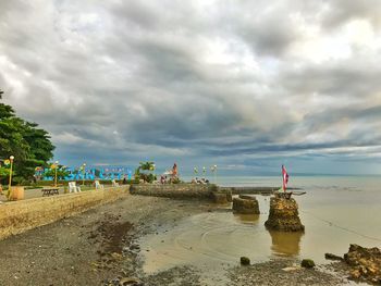 Scenic view of beach against sky