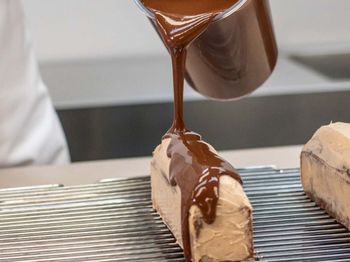 Midsection of man pouring water