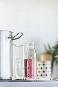 Close-up of glass jar on table