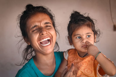 Cheerful mother and daughter