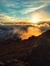 Scenic view of dramatic sky during sunset