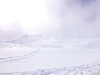 Scenic view of snow covered mountains