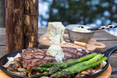 Close-up of meat on barbecue grill