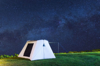 Low angle view of landscape against sky at night