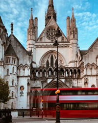 Royal courts of justice against sky in city