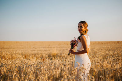 Woman standing in a field