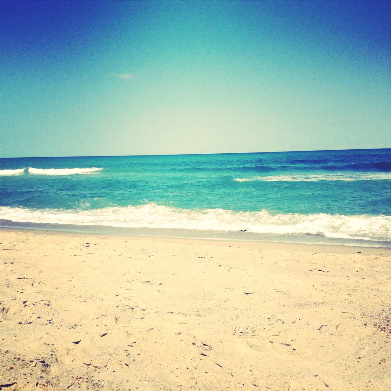 sea, beach, horizon over water, sand, water, shore, clear sky, tranquil scene, tranquility, copy space, scenics, blue, beauty in nature, nature, wave, idyllic, coastline, sky, remote, calm