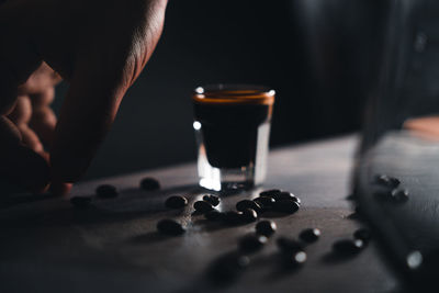 Midsection of man holding coffee