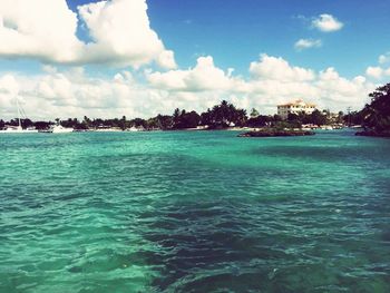 Scenic view of sea against cloudy sky