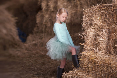 Girl standing on sand