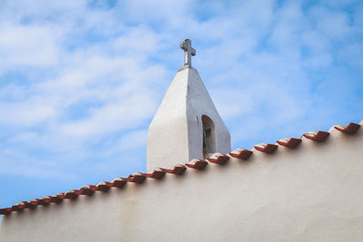 Low angle view of white building against sky