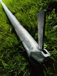 High angle view of rusty metal on field