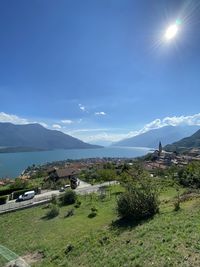 Scenic view of landscape and buildings against sky