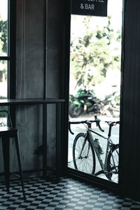 Bicycle on table by building