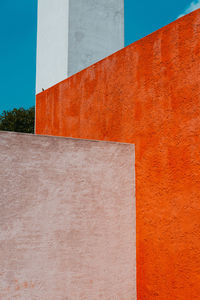 Low angle view of wall against building