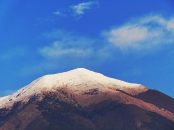 Scenic view of snowcapped mountain against sky