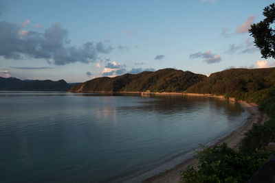 Scenic view of the  sea  against sky during sunset