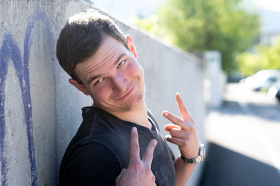 Portrait of man standing outdoors