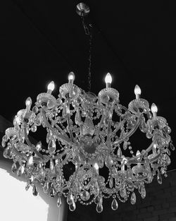 Low angle view of illuminated chandelier