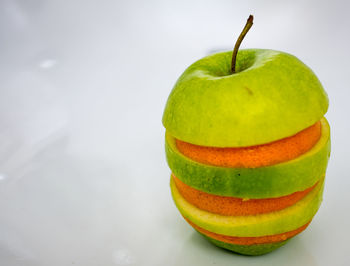 Close-up of fruit against white background