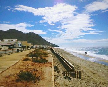 Scenic view of sea against cloudy sky