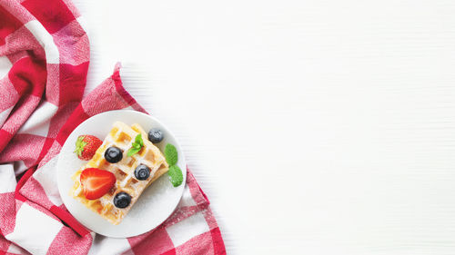 High angle view of dessert served on table