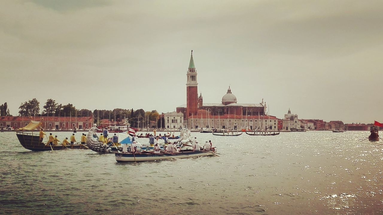 VIEW OF RIVER WITH CHURCH IN BACKGROUND