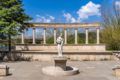 Dilijan, armenia - april 27, 2022 - woman statue holding a water jug at the amphitheater in dilijan