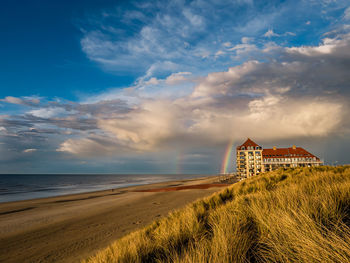 Scenic view of beach against sky