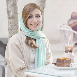 Portrait of smiling young woman