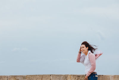 Young woman standing on ground