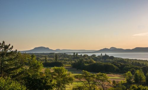 Scenic view of landscape against sky during sunset