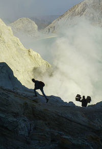 Man on rock mountain