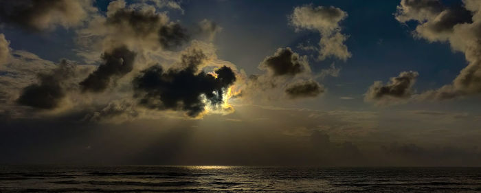 Scenic view of sea against sky at sunset