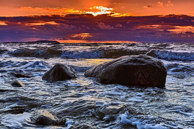 Scenic view of sea against sky during sunset