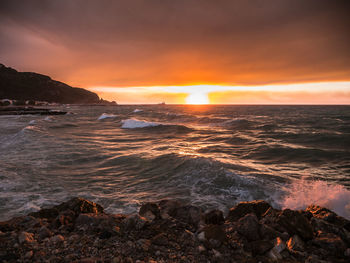 Scenic view of sea against sky during sunset