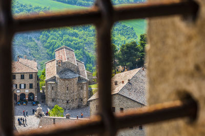 Old building seen through window