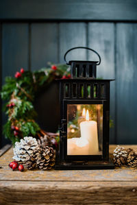 Close-up of candles in lantern