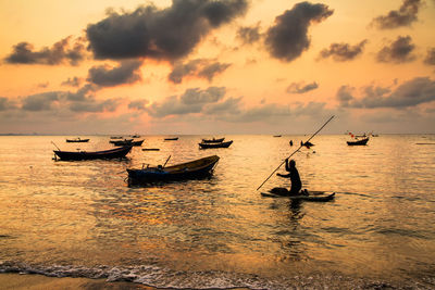 Scenic view of sea against sky at sunset