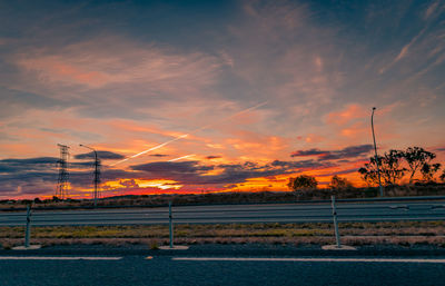 Scenic view of landscape against sky during sunset