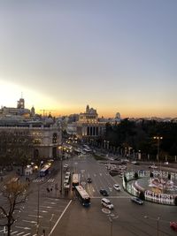 High angle view of traffic on road at sunset