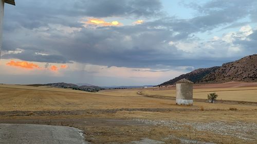 Scenic view of landscape against sky during sunset